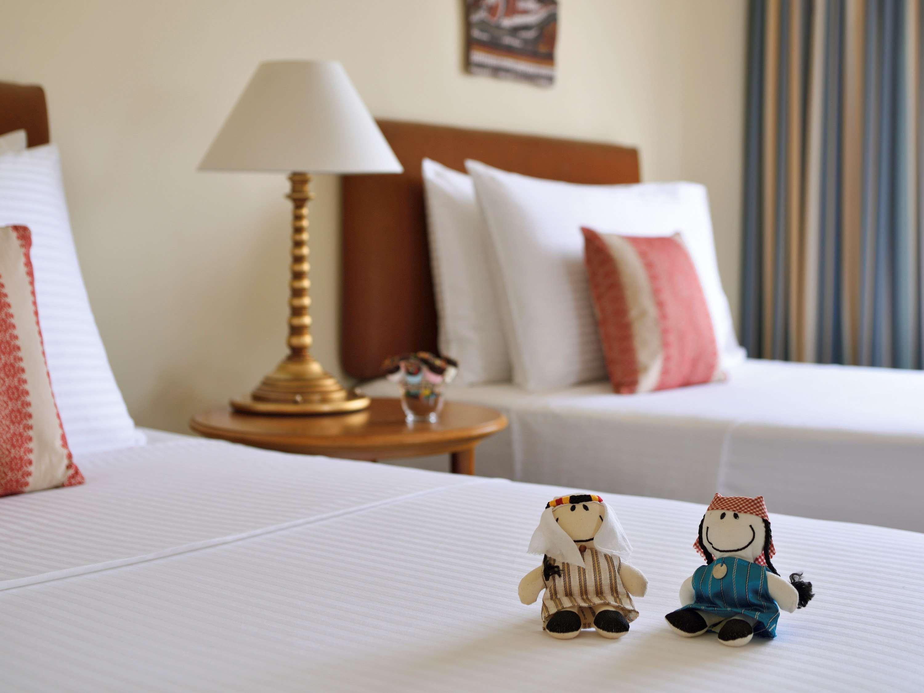 Moevenpick Resort & Residences Aqaba Exterior photo The hotel's mascot, the Bed Bugs