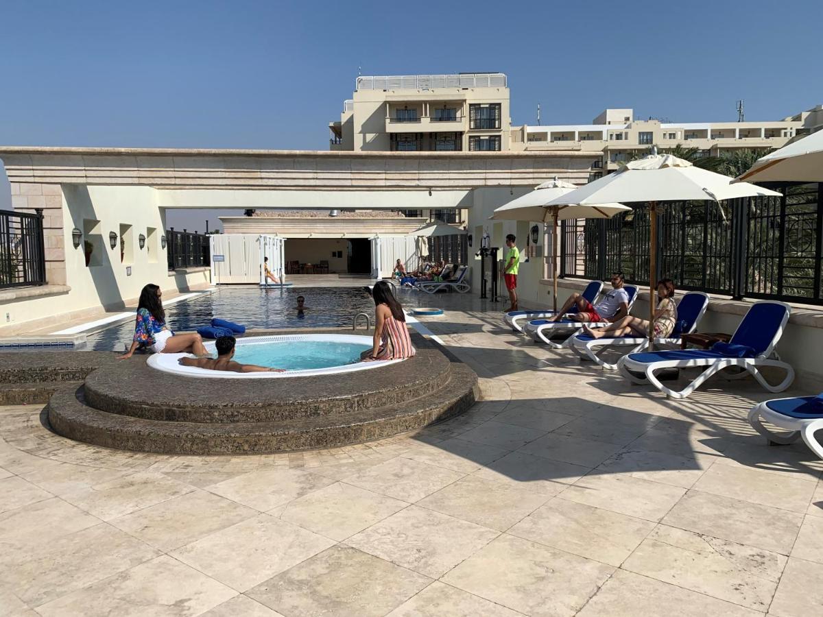 Moevenpick Resort & Residences Aqaba Exterior photo Rooftop pool at the Grand Hotel
